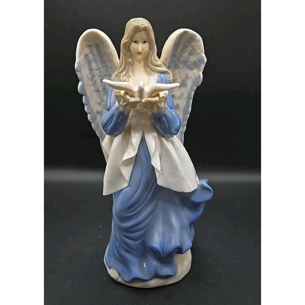 Ceramic Angel Blue And White Holding Dove In Hands 8.25" High